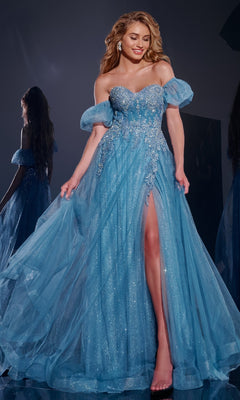 A woman poses elegantly on a dark reflective surface wearing the Jovani 40474 Long Blue Prom Dress with sparkling fabric, off-the-shoulder puff sleeves, and a high leg slit.
