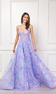 A woman stands indoors, smiling at the camera in an Amelia Couture 4050 Embellished Long Prom Dress featuring a sleeveless lavender A-line silhouette, deep V neckline, and floral patterns.
