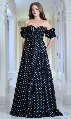 Long Prom Dress: Colors Dress 4053, a floor-length, off-the-shoulder black polka dot dress with white accents and puffed sleeves.