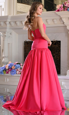 Long Prom Dress: Colors Dress 4058, a floor-length, hot pink satin gown with a corset back, a dropped waist, and an oversized bow.