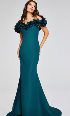 A woman models the Jovani 40595 long formal dress—a fitted, floor-length teal designer gown featuring off-the-shoulder floral details—against a plain background.