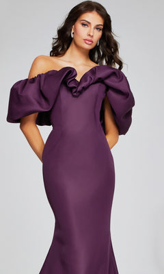 Woman wearing the Jovani 40596, a long formal off-the-shoulder fit-and-flare dress in deep purple with large ruffled sleeves, standing against a plain light background.