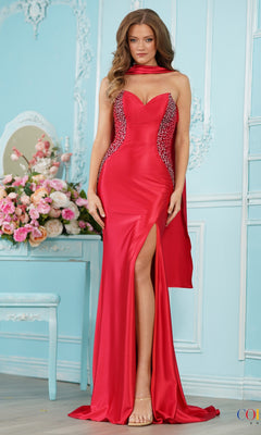 A woman wears a red Long Prom Dress: Colors Dress 4071, a floor-length strapless gown with a sweetheart neckline, crystal beaded side panels, and a high leg slit.