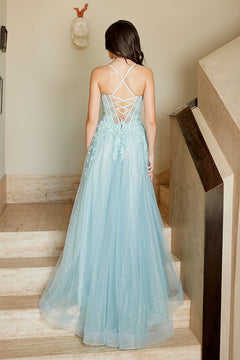 Back view of a light blue Amelia Couture 4074 floor-length gown with a lace-up corset back and floral lace bodice details, standing on a staircase.
