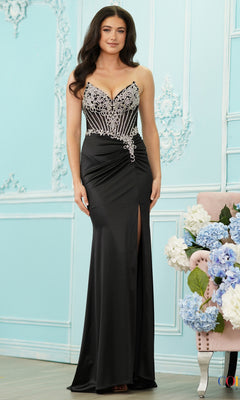 A woman wearing a black, strapless, floor-length Long Prom Dress: Colors Dress 4135, featuring a beaded bodice and a high thigh slit.