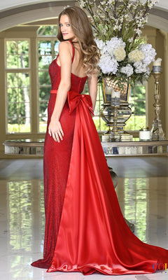 Colors Dress 4146 is a floor-length, shimmering red rhinestone mesh evening gown with a fitted bodice, thin straps, and a large satin bow at the back that flows into a train.
