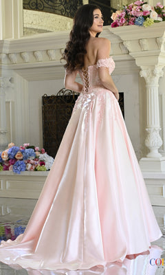 A woman wearing a pale pink off-the-shoulder lace Long Prom Dress: Colors Dress 4150 with a corset-style lace-up back.