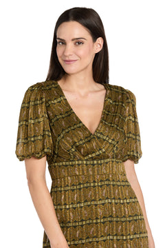 Woman with long dark hair wears the Long Plaid Wedding Guest Dress: R&M Richards 4157—an olive green dress featuring puffed short sleeves and subtle patterns—standing against a white background.
