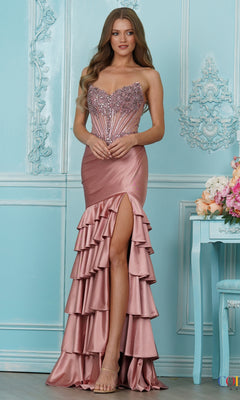 Long Prom Dress: Colors Dress 4185 in rose gold featuring a strapless beaded corset bodice, a high-leg slit, and a tiered skirt of satin ruffles.