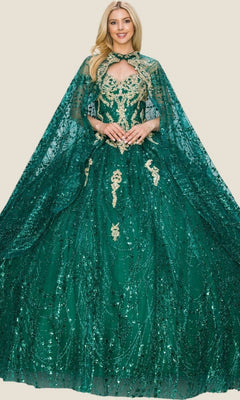 A woman wearing the Quinceanera Dress 4201 by Cinderella Couture—a green, floor-length ball gown adorned with gold embroidery and complemented by a matching sequined cape—stands against a plain background, radiating elegance.