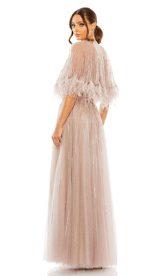 Woman wearing the Mac Duggal 42098 Feather-Cape Long Formal Dress in light pink with sequin accents, standing and looking over her shoulder against a white background.