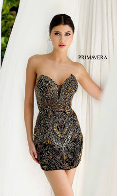 Wearing the Strapless Short Beaded Hoco Dress: Primavera 4226, a woman stands poised and radiant, exuding elegance and charm.
