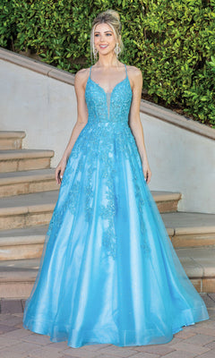 A woman stands on outdoor steps wearing the Floral-Embroidered Long A-Line Prom Dress 4231, a light blue gown with lace details and a deep neckline. Greenery and a stucco wall are in the background.