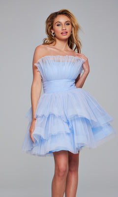 A woman models the Jovani Strapless Short Ruffled Hoco Dress 42340 in light blue tiered tulle, standing against a plain gray background.