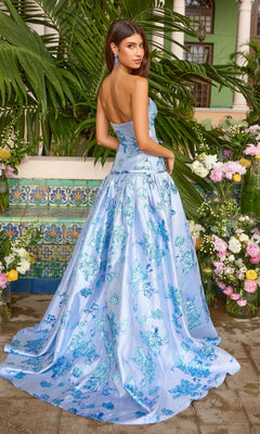 Ava Presley 42460 is a strapless, floor-length light blue ball gown featuring a darker blue metallic floral pattern and a full skirt.