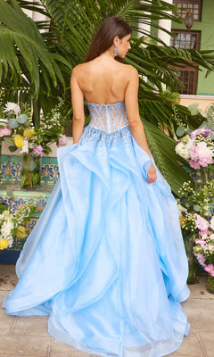 A person wears a periwinkle Ava Presley 42482 ball gown featuring a beaded bodice with a sheer panel and a voluminous, layered organza skirt.