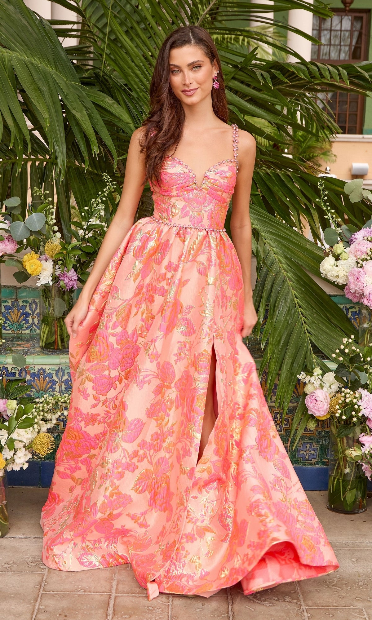 Coral pink Ava Presley 42549 floor-length A-line prom dress featuring a floral pattern, a sweetheart neckline, and a high leg slit.