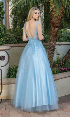 A woman stands outdoors near greenery and palm trees, wearing the Backless Glitter Tulle Ball Gown Prom Dress 4272 in light blue with floral embroidery, showcasing the elegance of a low-back prom gown.