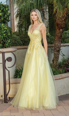 A woman stands outdoors amid greenery, wearing the Backless Glitter Tulle Ball Gown Prom Dress 4272—a sleeveless, floor-length gown with floral embroidery on the bodice.