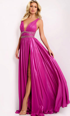 A woman models the Jovani 42817 long prom dress—a sleeveless, floor-length fuchsia gown with a high slit and beaded waistband—against a plain light background.