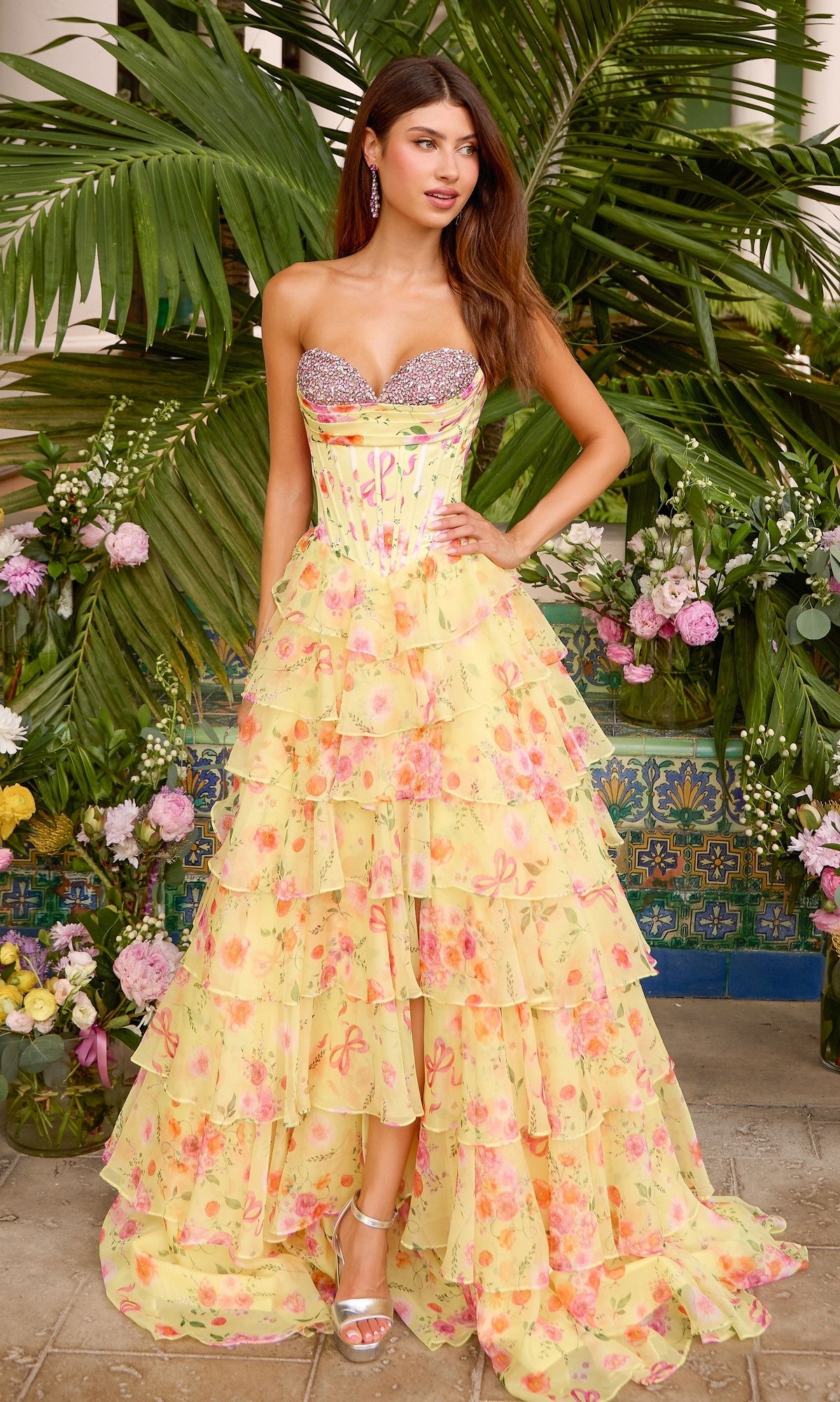 Long Prom Dress: Ava Presley 43034, a strapless yellow floral prom dress with a sequined corset bodice and a high-low hemline.