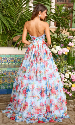 Ava Presley 43036 floor-length strapless gown featuring a sweetheart neckline, crystal-embellished corset bodice, and a tiered, multi-colored floral print skirt.