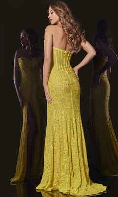 A woman stands with her back to the camera in a Jovani 43093 long prom dress featuring a strapless lace design, fitted bodice, and subtle leg slit, reflected in two mirrors against a dark background.