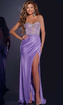 A woman wears the Jovani 43197 long prom dress featuring a lavender hue, embellished sweetheart bodice, thin straps, and a thigh-high slit, posing against a dark background.
