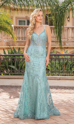 A woman stands outdoors by a railing and tropical plants, wearing the Sheer-Bodice Long Glitter Prom Dress 4336 in pale blue.