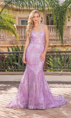 A woman stands outdoors on a brick patio in the Long Glitter Mermaid Formal Prom Dress 4337—a floor-length, lavender sequin gown—surrounded by greenery and a building.