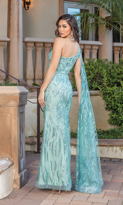 A woman stands outdoors, looking over her shoulder in a fitted, floor-length One-Shoulder Long Glitter Prom Gown with Cape in light blue featuring draped fabric.