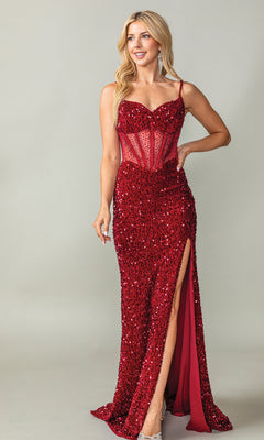 A woman models the Lace-Up Long Sequin Prom Dress: Dancing Queen 4360—a fitted red gown with a beaded sheer corset bodice, thin straps, and thigh-high slit—standing against a plain light background.