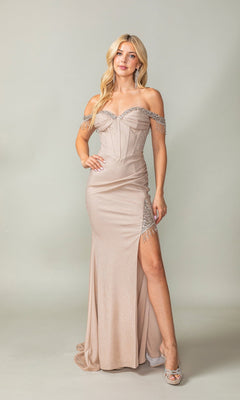 A woman in the Dancing Queen 4368 Fringe Long Glitter Prom Dress in mocha, featuring an off-the-shoulder neckline, elegant beaded details, and a thigh-high slit, stands gracefully against a neutral background.