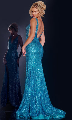 A woman poses with her back to the camera in a backless, floor-length blue sequin Jovani 43725 prom dress, her reflection visible behind her.