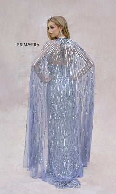 A woman faces away in the Primavera 4376 strapless sequined long prom dress with sheer matching cape, set against a neutral background. "PRIMAVERA" appears on the left.