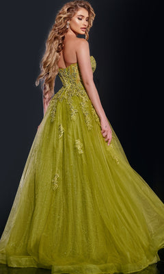A woman in a Jovani 43849 long green lace embroidery prom dress.
