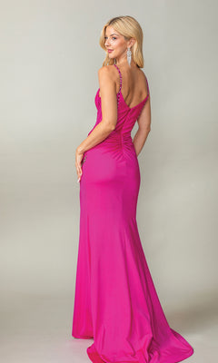 A woman stands facing away, looking over her shoulder, wearing the Long Ruched Glitter Prom Dress: Dancing Queen 4388 in bright pink with a fitted silhouette and long earrings against a plain background.