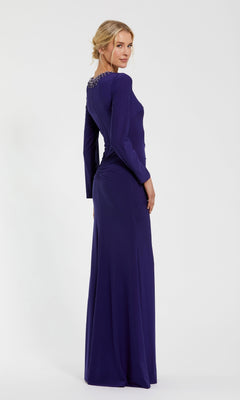 A woman in the Mac Duggal 44069 Bead-Neckline Long Formal Dress, a floor-length dark purple gown with embellished upper back and long sleeves, stands sideways against a plain white background.