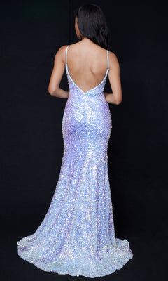 A woman with long dark hair models the Nina Canacci 4410, a sparkly sequin long formal dress with thin straps and a thigh-high slit, backless design, standing against a black background facing away from the camera.