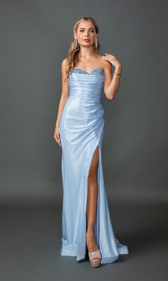 A woman stands against a gray background wearing the Dancing Queen 4411 strapless long prom dress in light blue, which features a sweetheart neckline, sparkling bodice, thigh-high slit, and silver high heels.