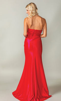 A blonde woman faces away from the camera, modeling the Strapless Long Prom Dress: Dancing Queen 4411, which features a beaded sweetheart neckline, against a plain light background.