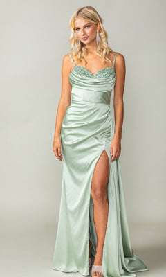 A woman wears the Beaded-Bust Long Prom Dress (Dancing Queen 4412) featuring a pastel hue, beaded sweetheart neckline, spaghetti straps, ruched side, and thigh-high slit, standing against a plain background.