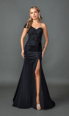 A woman models the black Dancing Queen 4415, a fitted one-shoulder long prom dress with a beaded corset bodice and thigh-high slit, standing against a plain gray background.