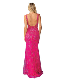 A woman with blonde hair wears the Long Sequin-Print Prom Dress, Dancing Queen 4418—a bright pink, floor-length gown with sequins and a low-cut back—while standing facing away from the camera.
