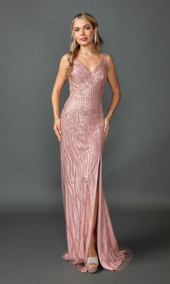 A woman in a rose gold Dancing Queen 4418 long sequin-print prom dress with a v-neckline and thigh-high slit stands against a plain gray background.