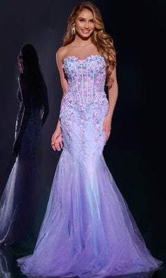 A woman wearing the Strapless Long Mermaid Prom Dress Jovani 44211 in lavender with floral embellishments stands smiling, her reflection visible behind her.