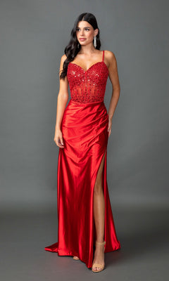 A woman wearing a red Sequin-Corset Long Prom Dress (Dancing Queen 4432) with a beaded bodice, high slit, and spaghetti straps stands against a plain gray background.