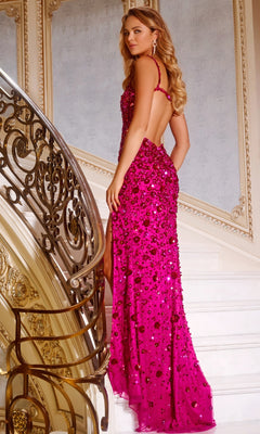 A woman in the Jovani 44440 Beaded-Floral Long Prom Dress stands on a white staircase with ornate gold railings, looking over her shoulder.