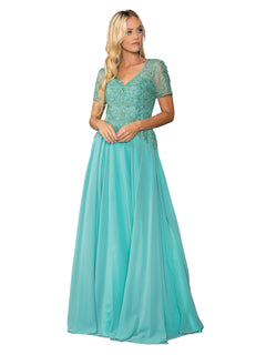 A woman wearing the Dancing Queen 4445 short-sleeve long formal dress with an embroidered lace bodice and flowing A-line skirt stands against a white background.