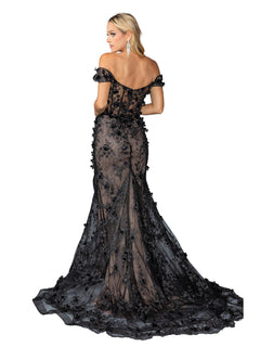 A woman poses with her back to the camera in the Long Black and Nude Prom Dress: Dancing Queen 4457, a floor-length off-the-shoulder gown featuring sheer lace and elegant floral appliqué.